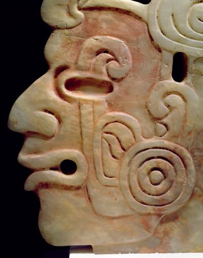 Profile of a man with earrings by Aztec